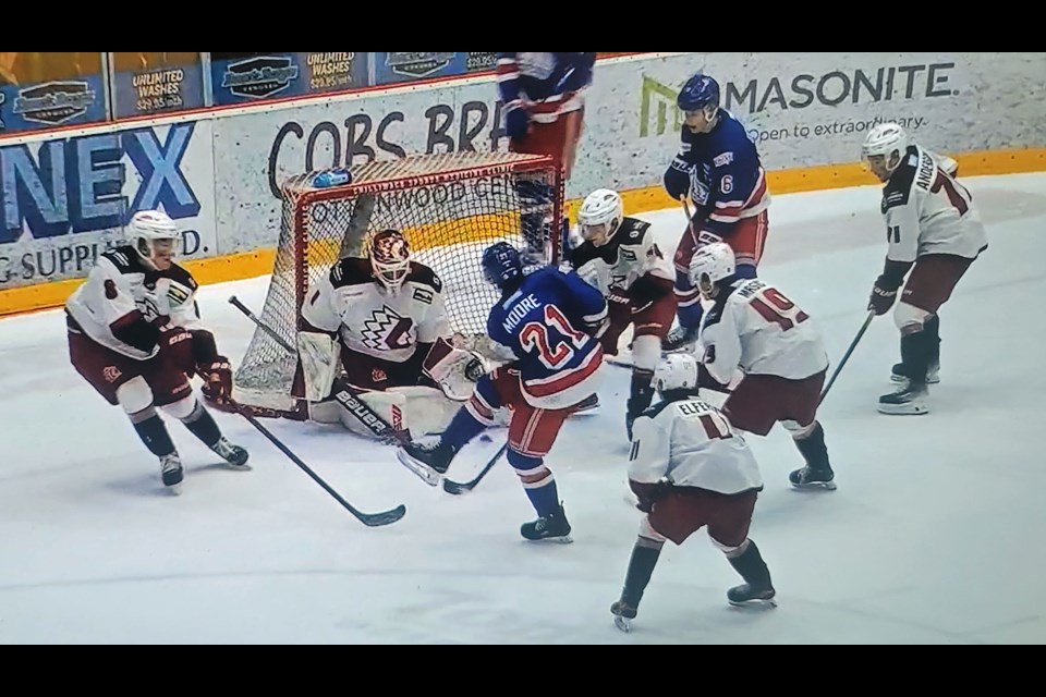 Spruce Kings forward Will Moore draws a crowd of Chilliwack Chiefs as he lets go the shot with linemate Owen Goodbrand standing just outside the crease trying to get to the rebound with about a minute left in Game 5 in BCHL playoff action Friday, April 11, 2025 in Chilliwack. The Chiefs hung on to win 2-1.