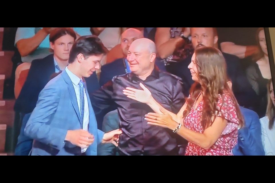 Nico Myatovic shares the moment with his parents Marco and Karen after he heard his name called by the Anaheim Ducks, who selected the Prince George native with the first pick of the second round, 33rd overall, at the NHL draft in Nashville.