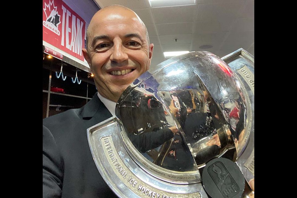 Prince George native Dan De Palma holds the IIHF U-18 World championship trophy.