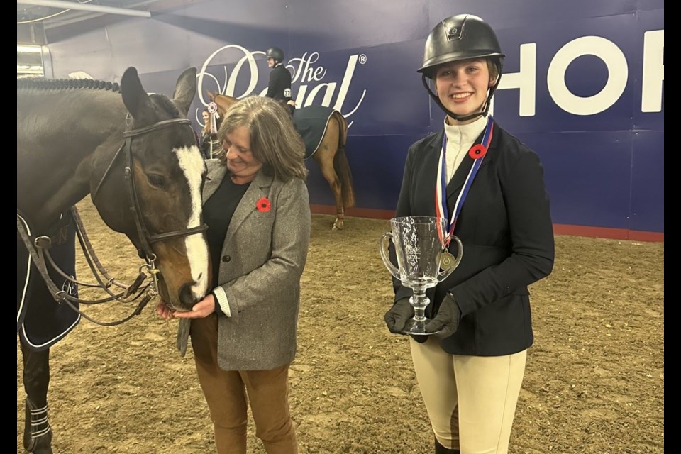 Prince George's Colby Winther-Konig, 15, takes national double header in horse jumping with championship titles for Jump Canada National and Canadian Equestrian Team that took place in Toronto this week during the Royal Winter Fair. With the horse on the left is Colby's mom and trainer Sorine Winther.