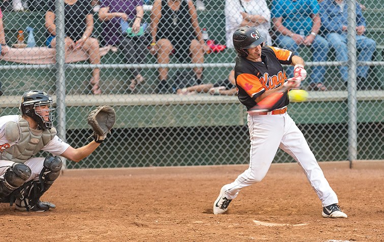 Big Guy Lake River Kings batter Randy Potskin makes contact with the ball against the STK Orioles on Sunday night at Spruce City Stadium in the championship game of the John Cho Cup.