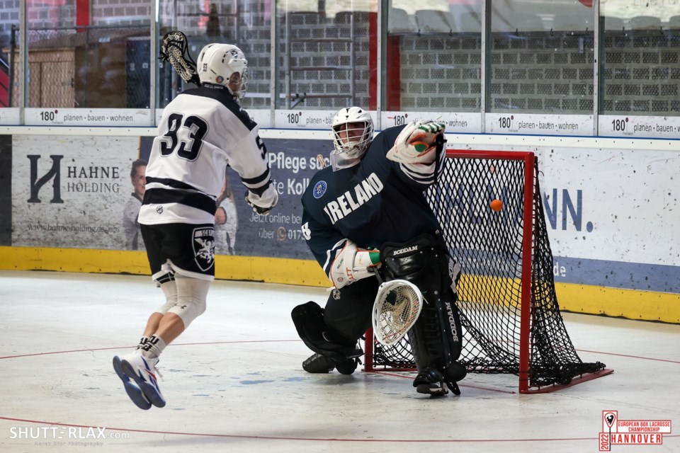 Cole Paciejewski of Prince George scores for Scotland on Team Ireland goalie Jonathan McMillan Sunday at the European Indoor Lacrosse Championship in Hannover, Germany. Scotland won 16-9.