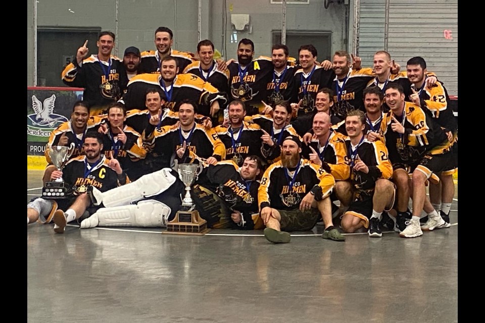 The Port Coquitlam Hitmen celebrate winning the Fred Doig Trophy as provincial senior C champions and also they claimed the Glen 'Moose' Scott Invitational title after an 11-6 win over the Prince George Scamp Transport Devils on Sunday, Aug. 11 at Kin 1.