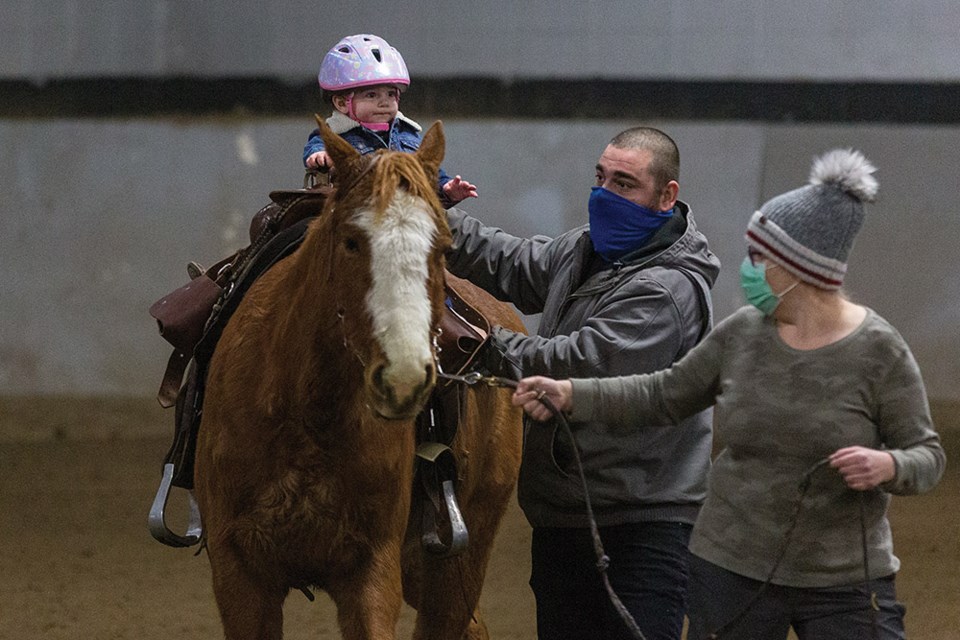 Citizen Photo by James Doyle. Amelia Denman rides Sweet around Prince George Agriplex on Sunday afternoon while competing in the Prince George Rodeo Association's Barrel race event. 