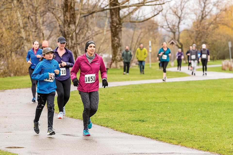 Citizen Photo by James Doyle. Runners make their way around Lheidli T'enneh Memorial Park on Sunday morning while competing in the Prince George Road Runners Mother's Day 5k.