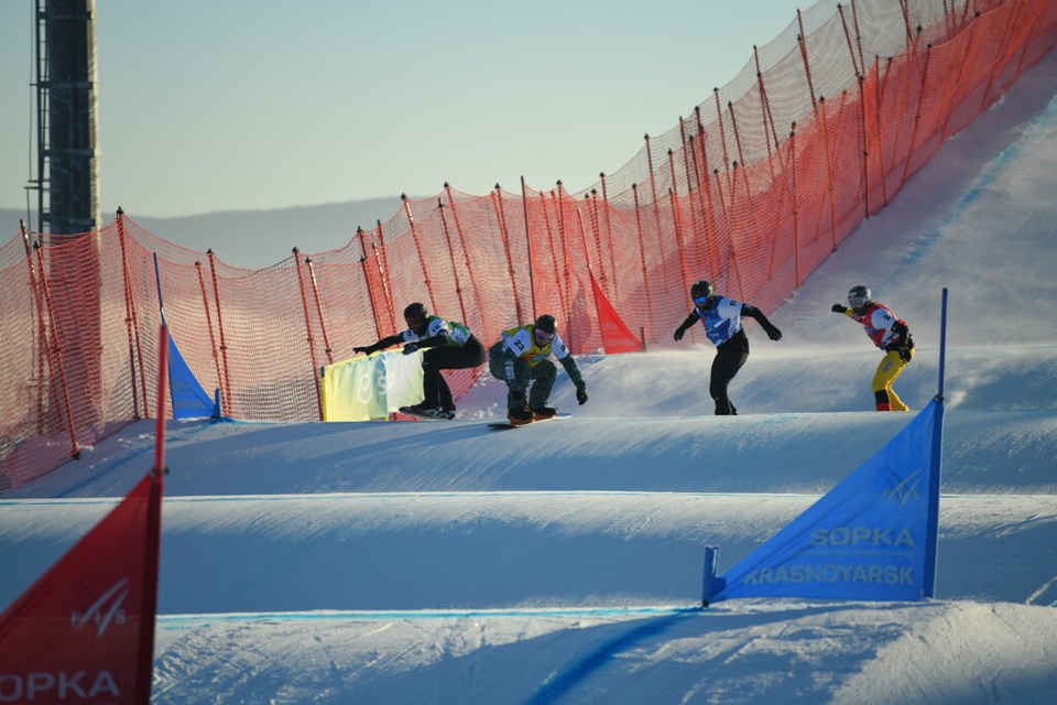 Evan Bichon, second from left, has the lead during his heat race at the World Cup snowboard cross event Saturday in Krasnoyarsk, Russia. Bichon went on to finish a career-best 12th. He and fellow Prince George boarder crossers Meryeta O'Dine and Colby Graham will be action in the second race which starts Saturday at 9 p.m. PT.