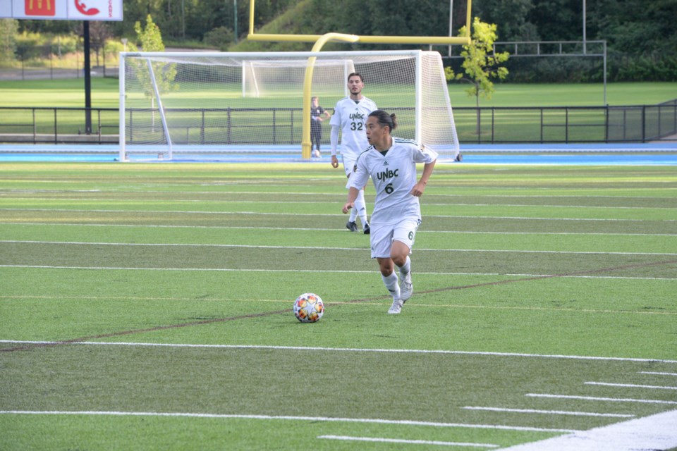 UNBC Timberwolves men's soccer team in action against the Trinity Western Spartans.