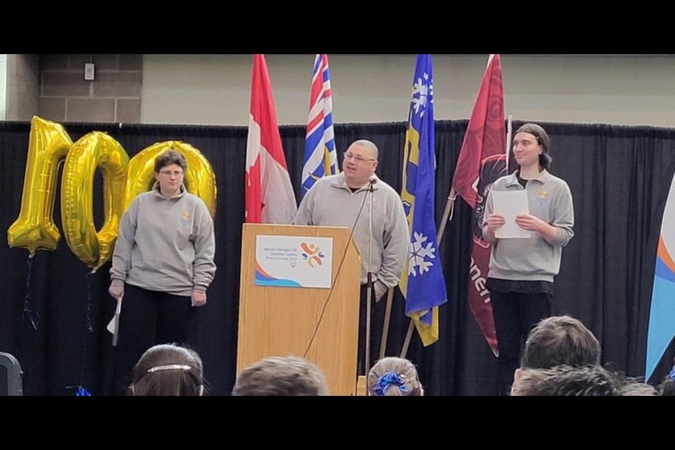 Marinka VanHage, Adam Spokes and Chase Caron, Special Olympics athlete ambassadors, take to the stage during the 100 Days Out celebration for the 2025 BC Summer Games that comes to Prince George from July 10 to 12.
