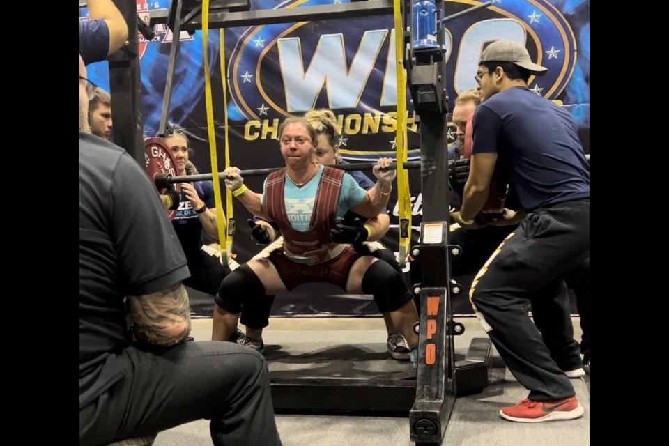 Prince George powerlifter, Tara Webber, goes for broke during the Olympia World Powerlifting Organization competition in Florida and lifted 705 lbs. during her squat.