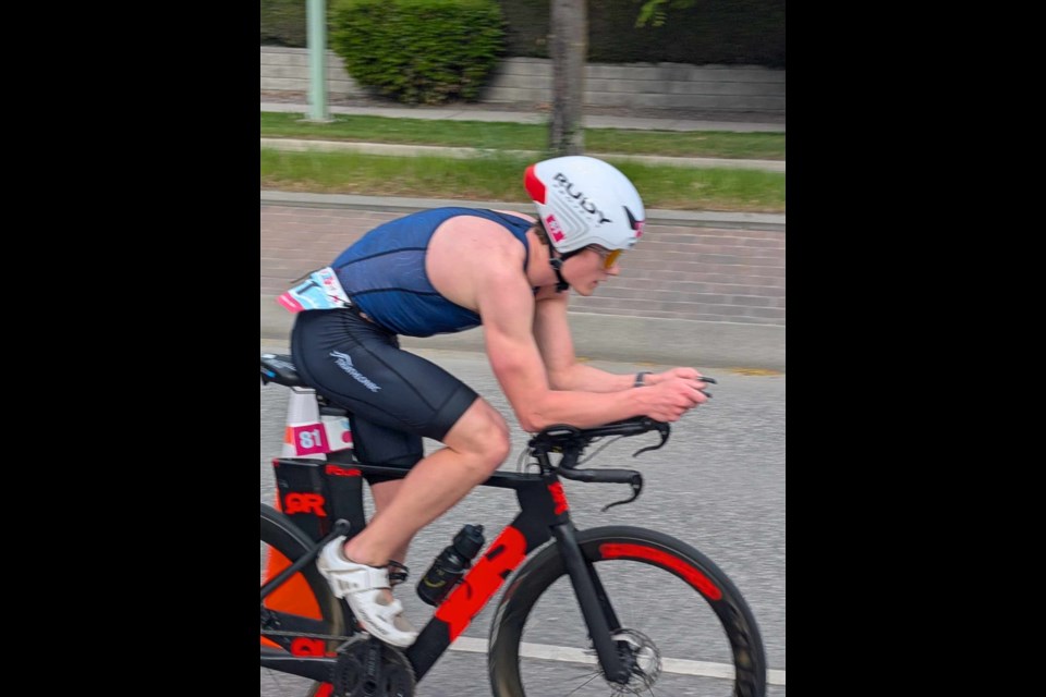 Josiah Wilkinson of Prince George competes in the bike event at the Apple Blossom sprint triathlon May 4, 2025 in Kelowna. He was the overall title.