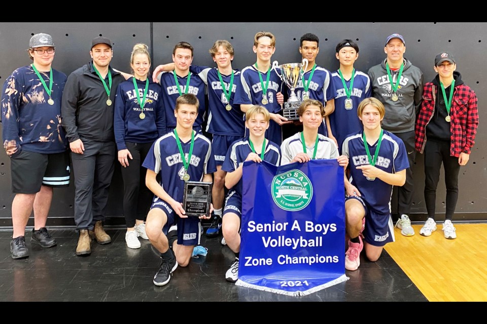 The Cedars Christian Eagles senior boys volleyball team celebrate its North Central zone title after the Eagles defeated the Valemount Timberwolves in straight sets in the final Saturday at Duchess Park.