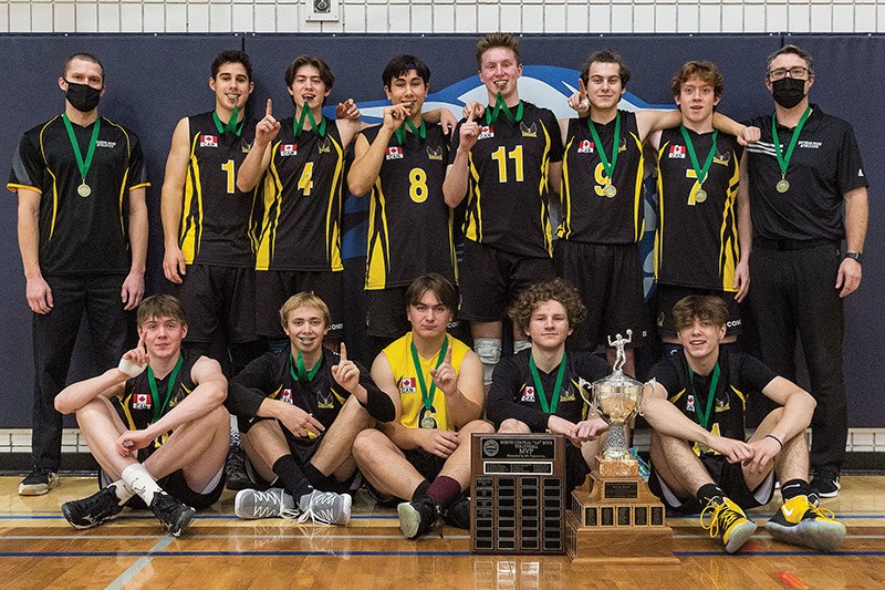 Citizen Photo by James Doyle. The Duchess Park Condors pose for a photo with their trophy after defeating the College Heights Cougars in the gold medal game of the Senior Boys AA North Central Zone Volleyball Championship on Saturday afternoon at College Heights Secondary School gymnasium.