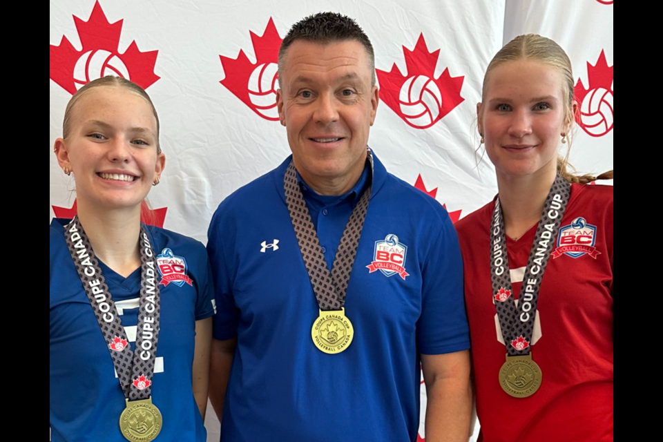 Tyler Dahl, right, poses with teammate Delaney Turner, far left, and 16U provincial team coach Mark Lafleur after they won the 16U championship at the Canada Cup tournament in July 2024.
