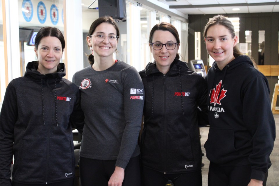 Kerri Einarson, skip, Shannon Birchard, second, Val Sweeting, third, and Briane Meilleur, lead, of Team Canada took a moment to pose for a photo at the Prince George Golf & Curling Club Thursday morning just ahead of the World Women's Curling Championship to be held at CN Centre starting Saturday.