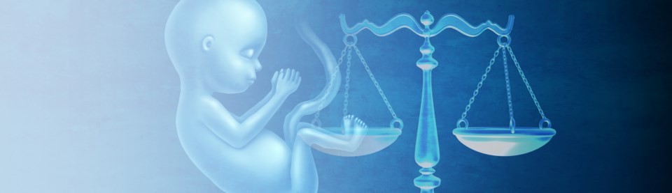 fetus scales of justice