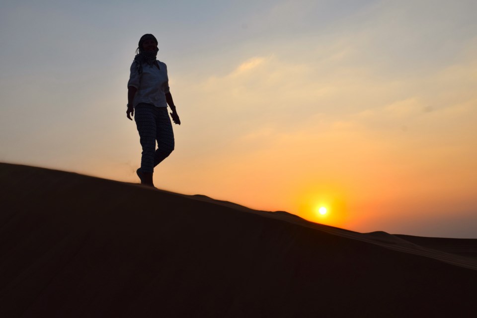 A break from dune bashing to admire the desert sunset.