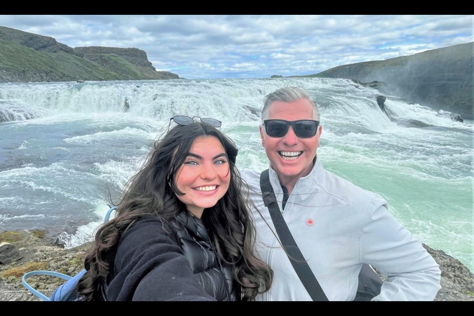 Grace and Steve MacNaull mug for a daughter-father selfie at Gullfloss waterfall.