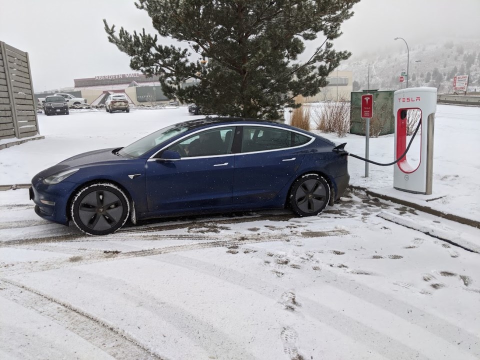 14 Electric vehicle Tesla charging winter