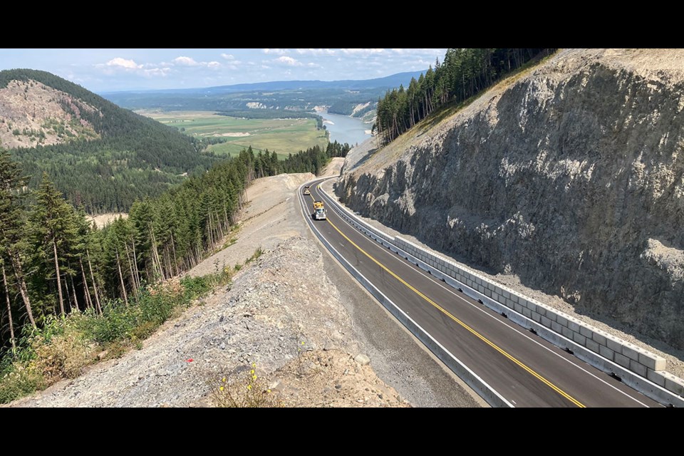 A new 5.6-kilometre section of West Fraser Road is now open, bypassing the active slide areas that washed out the road in 2018. The new alignment, a two-lane paved road, is on the east side of Narcosli Creek.
