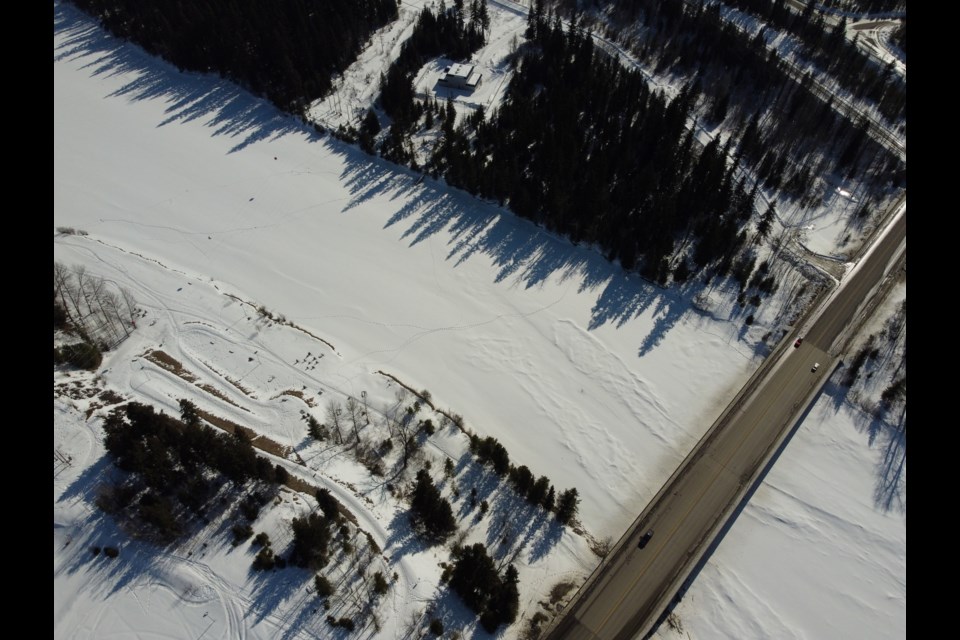 This aerial shot taken above the Foothills Bridge and Nechako Riverside Park show the still frozen Nechako River.