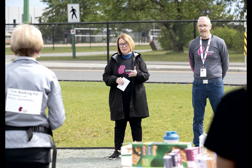 Prince George-Valemount MLA Shirley Bond and Prince George Kidney Foundation President Paul Ravelle address the assembled walkers at Masich Place stadium on Sunday, June 2, 2024 in Prince George, B.C. To date the PG walk has raised $11,175 toward the goal of $20,000.