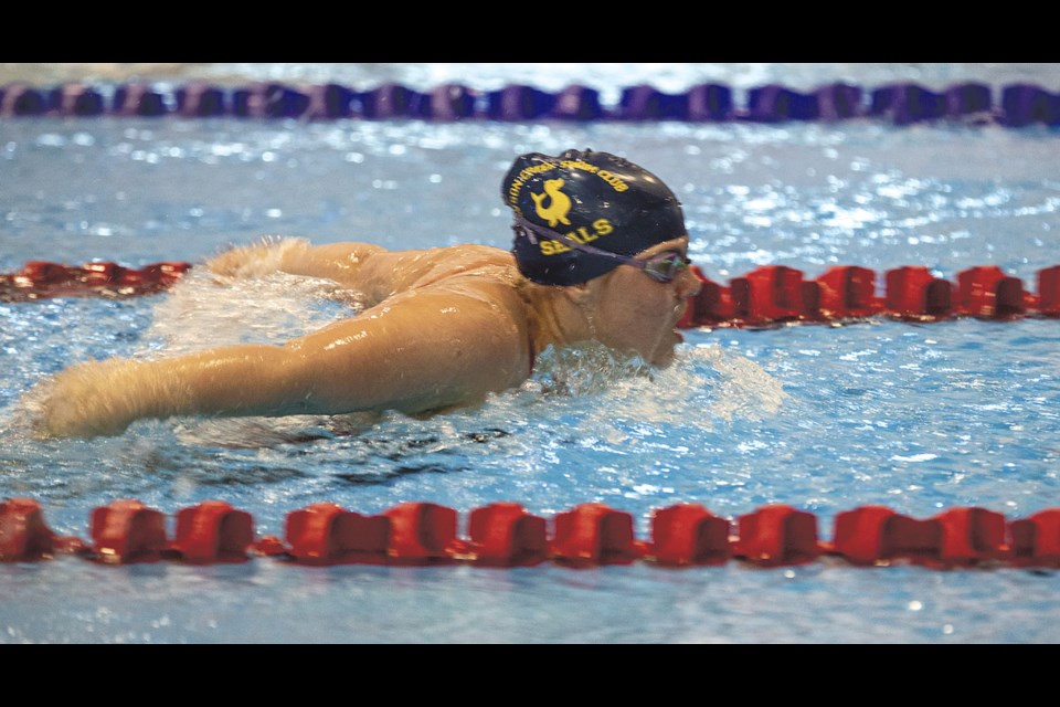 Chloe O'Dwyer of the Dawson Creek Swim Club Seals butterflies to the front of her 200 metre Individual Medley event Saturday during the 2024 Lincoln James Whitehead Memorial Swim Meet at the Prince George Aquatic Centre.