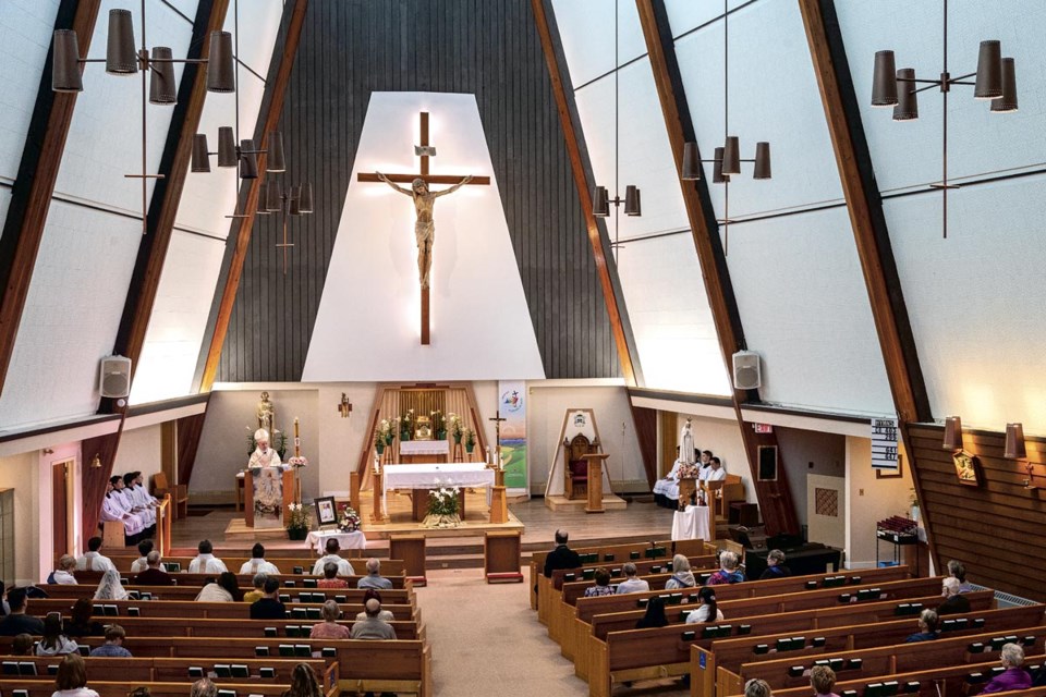 Parishioners attend a mass for the Pope Francis officiated by Bishop Stephen Jensen Friday, May 2, 2025 at Sacred Heart Cathedral. 