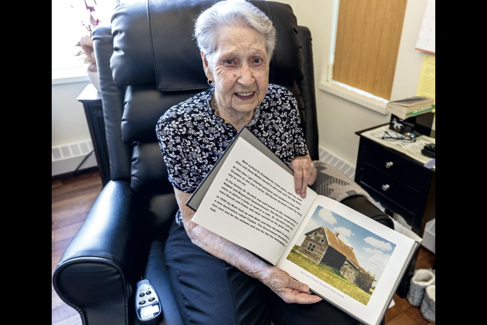 Maxine Wilson, 98, has lived in Prince George for the last 78 years and talks about her life here. Maxine is showing off the first book she has written for her family about her early years in Saskatchewan and the photo is of her grandparents' homestead, where she was born in 1926.