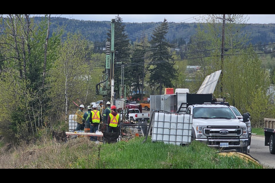 MTO crews work at the Highway 97 access at Cameron Street on Monday, May 5, 2025 in Prince George, BC. The traffic circle is closed for a week while soil engineering tests are carried out in preparation for a new multi-use trail.