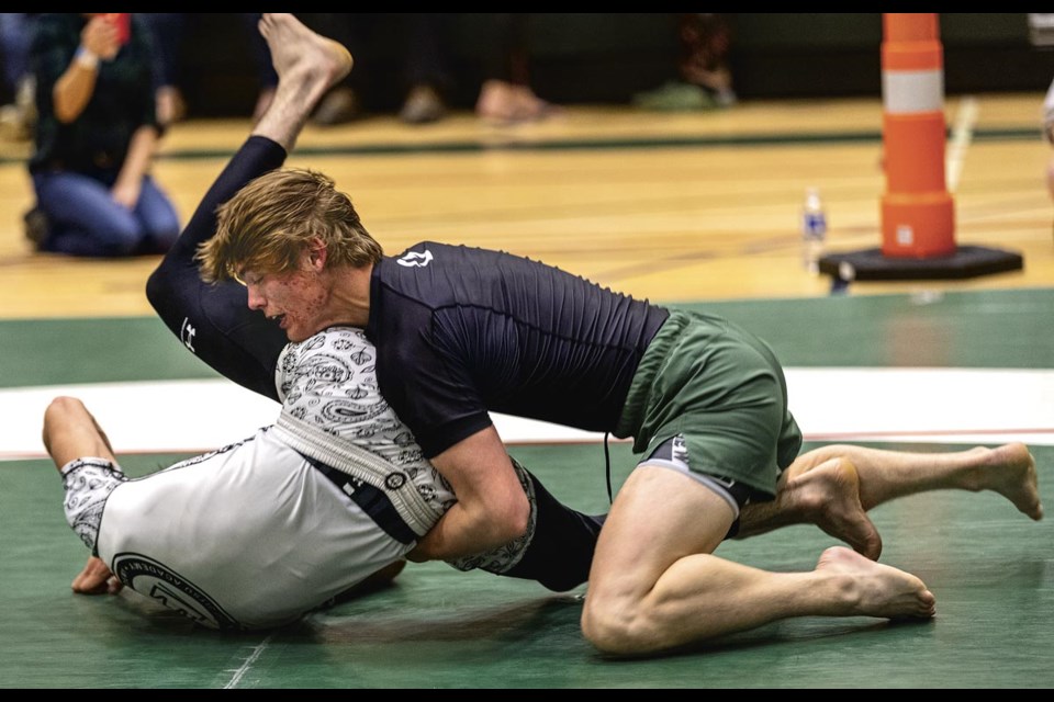 Ayden Harder tries to apply a submission hold on Hayden Rushton during their adult 149lb match at the Northern BC Combat Challenge held at PGSS Saturday, May 17, 2025