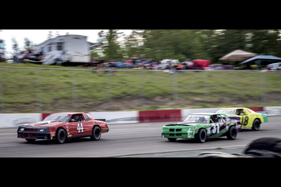 Street Stocks 44, Grant Powers leads 31, Rob Verkaik and 18, Lawrence Barks into turn four at PGARA Speedway Saturday, June 14, 2025.