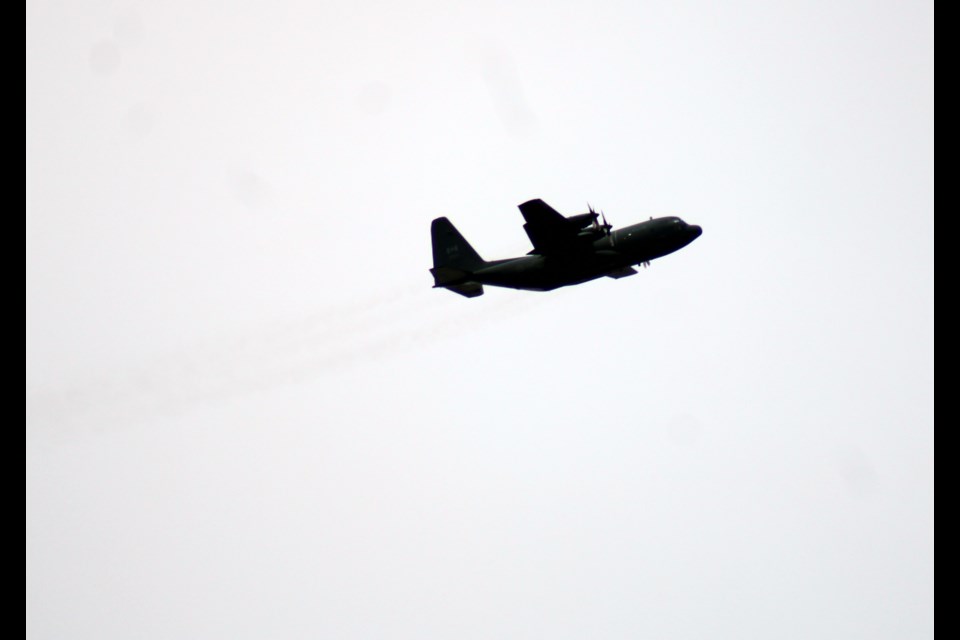 A Canadian Forces Hercules circles over Prince George, B.C. on Monday, July 29, 2024.