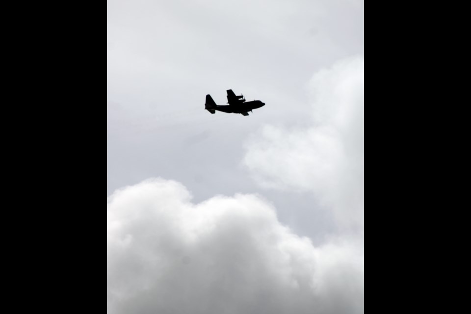 A Canadian Forces Hercules circles over Prince George, B.C. on Monday, July 29, 2024.