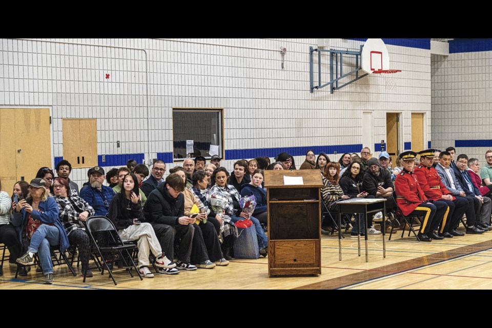 The family and friends of the 2025 class of the PG RCMP Youth Academy wait for the graduation ceremony Saturday, March 22, 2025.