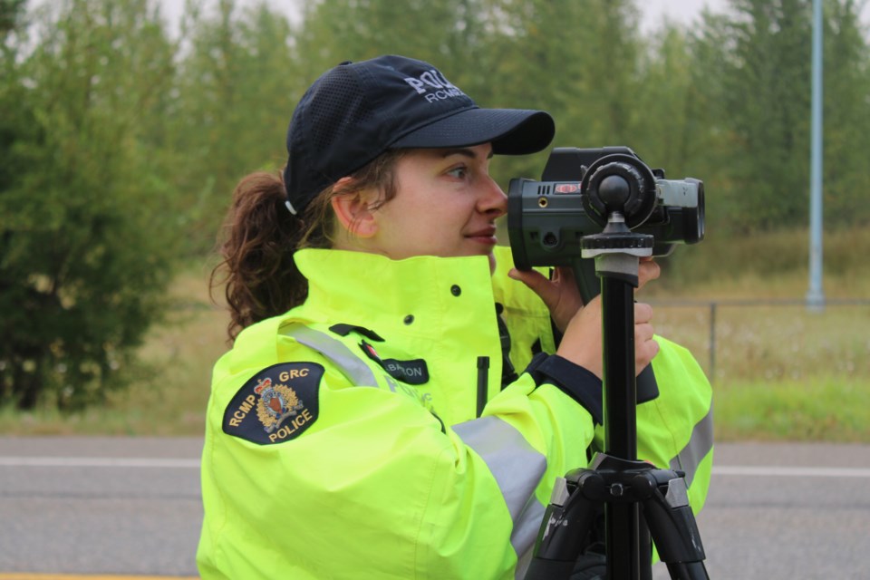 A BC Highway Patrol Officer looks for speeders on Giscome Road on Tuesday, Sept. 3, 2025, in Prince George, BC.