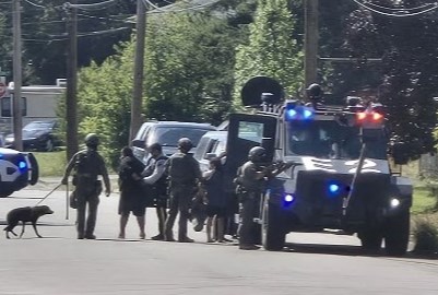 A suspect is arrested by Prince George RCMP on Redwood Street on Wednesday, July 30, 2025 in Prince George, BC.