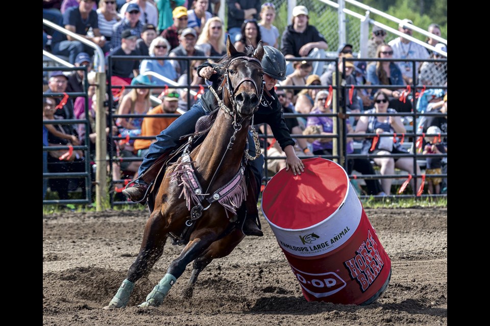 Prince George's Jaecey Gullickson tries to keep the second barrel upright during the Rodeo Prince George PeeWee Barrel Racing at the Prince George Exhibition Grounds Saturday, June 14, 2025.