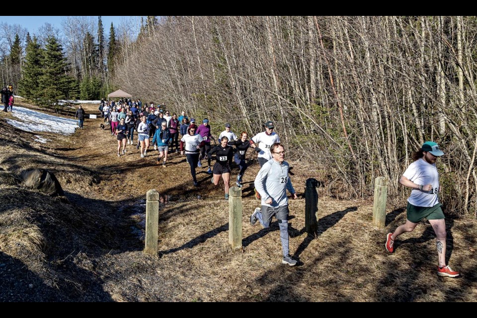 About 70 runners leave the start of the 5 kilometre Run for Rural Medicine at the parking lot of the Cranbrook Hill Greenway to raise money for Hope Air Saturday, April 12, 2025. Run & Ride for Rural Medicine is an annual fundraiser organized by a team of medical students from UBC’s Faculty of Medicine in Vancouver, Kelowna, Prince George, and Victoria. 