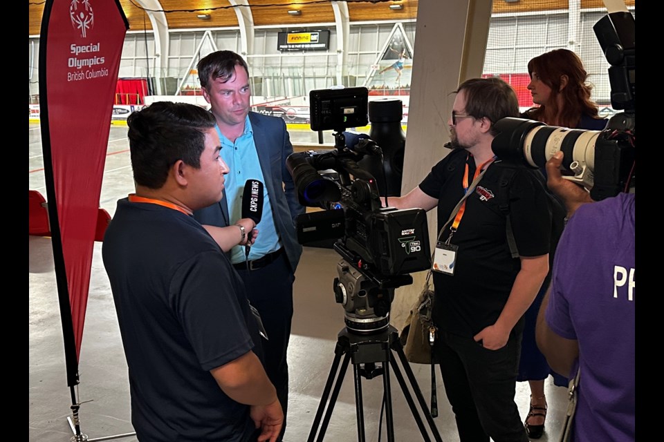 BC Minister of Tourism, Culture, Sport and Art Spencer Chandra Herbert speaks to reporters at the Kin 1 arena on Thursday, July 10, 2025 in Prince George, BC.