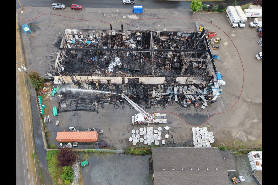Aerial footage shows the damage done to the Spotless Uniform and Linen building on Kenworth Road East at Highway 97 in Prince George, BC on Wednesday, Aug. 6, 2025.