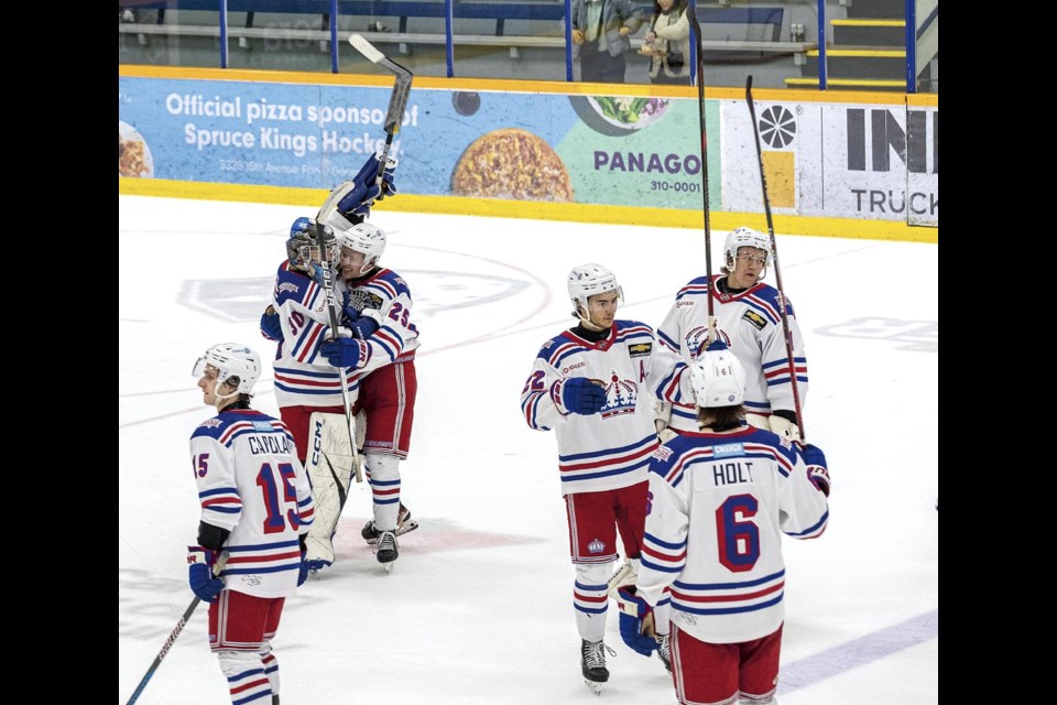 Spruce Kings goalie Charles Gravel gets a hug and a smile from forward Carter Hesselgrave as the team salutes their fans following a 2-0 victory against the Chilliwack Chiefs in Game 6 of their BCHL Coastal Conference quarterfinal playoff series Sunday, April 13, 2025 at Kopar Memorial Arena.
