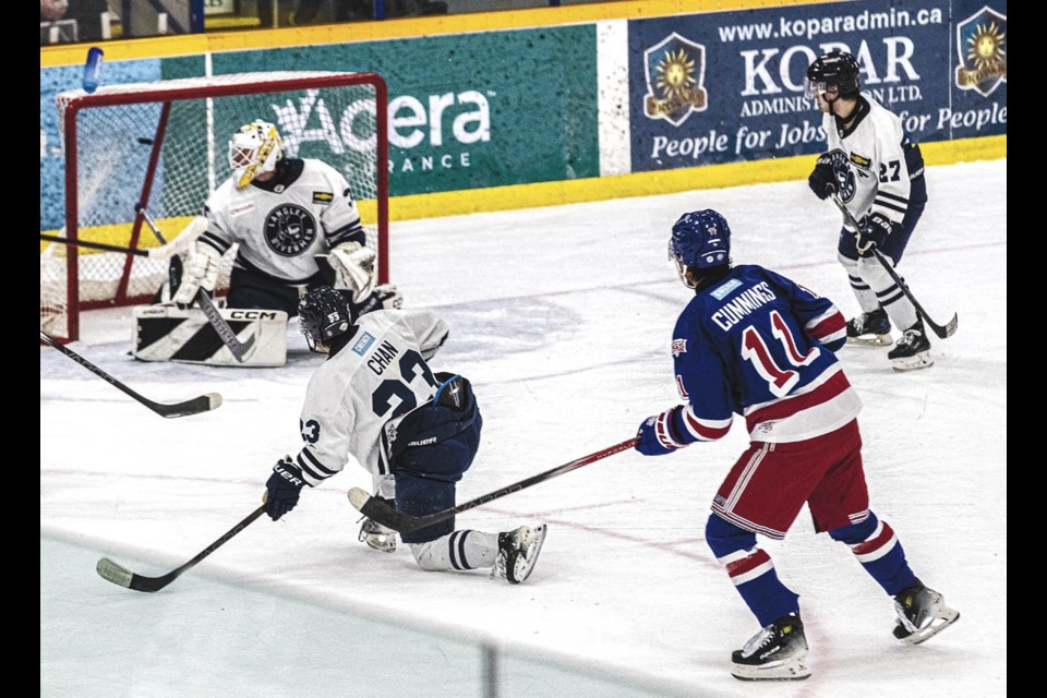 Spruce Kings forward Brock Cummings' shot finds the back of the net behind Rivermen goalie Dylan Johnson Friday March 7 at Kopar Memorial Arena.