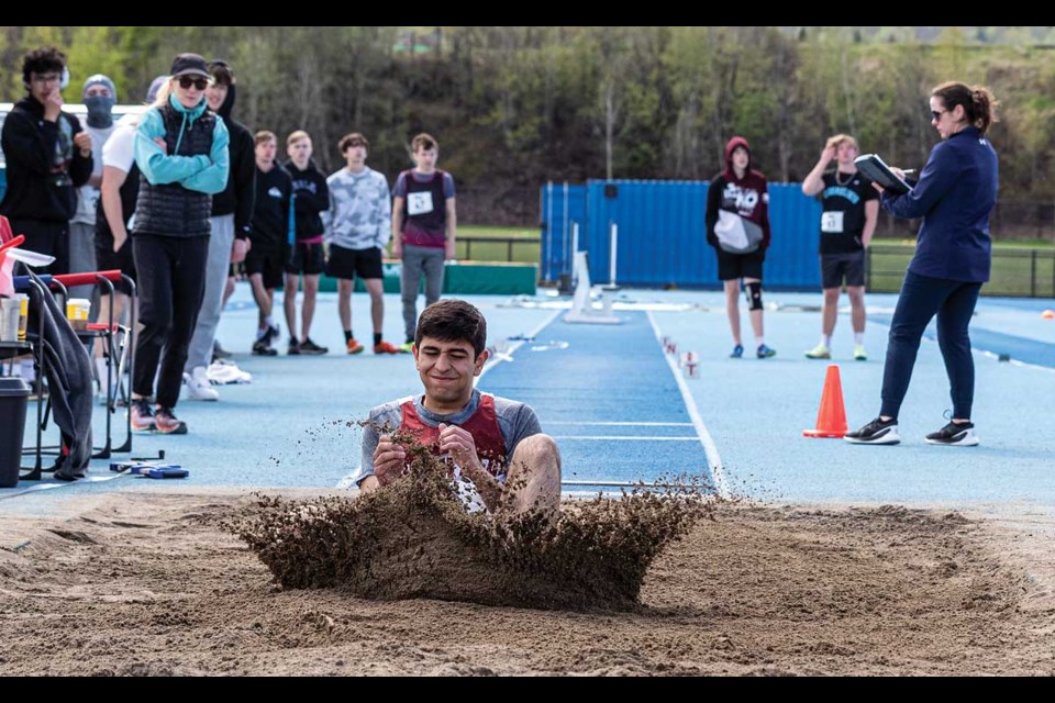 Uriel Vera of North Peace Secondary School in Fort St. John lands too deep in the pit shortening his jump by allowing his bottom to come in contact with the sand in the Men's 16-17 Long Jump competition Sunday, May 4, 2025 at the Sub Zero Track Meet held at Masich Place Stadium.