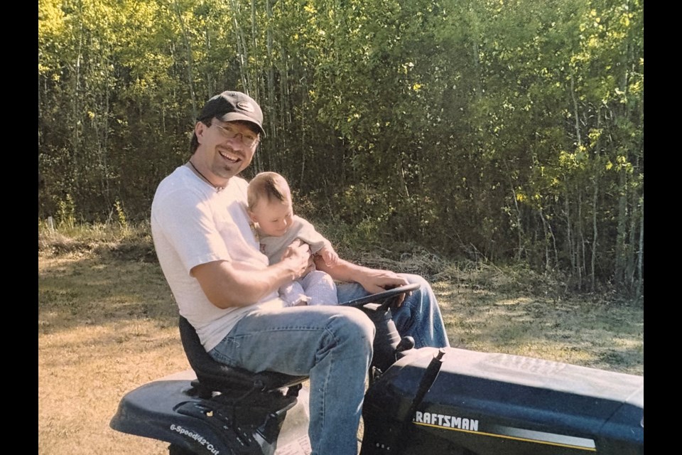 Amber Suvee as a baby with her father, Les Suvee. 