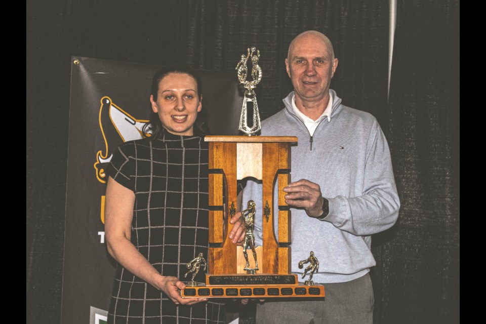 UNBC Timberwolves forward Sveta Boykova receives the Women's Basketball MVP Award from coach Sergey Shchepotkin as well as receiving the UNBC Timberwolves Female Athlete of the Year Award Sunday, April 6, 2025 at UNBC.