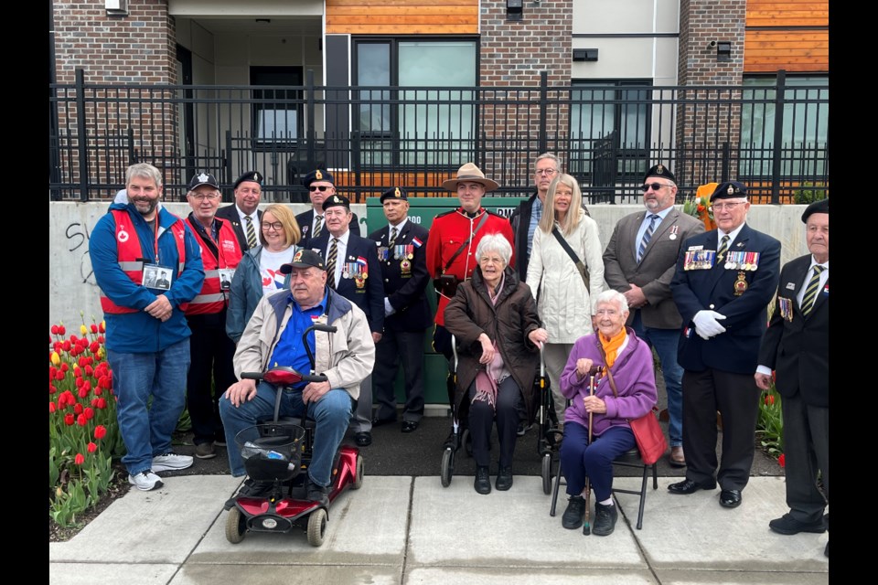 Members of the Legion, survivors of the Nazi occupation of the Netherlands and relatives of those who survived the occupation gather Saturday, May 17, 2025 In Prince George, BC.