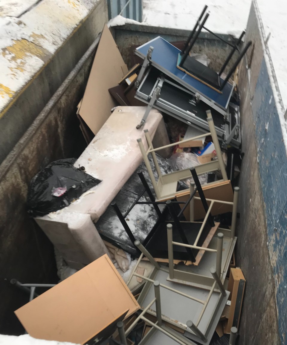 sd-57-dumps-desks-in-landfill