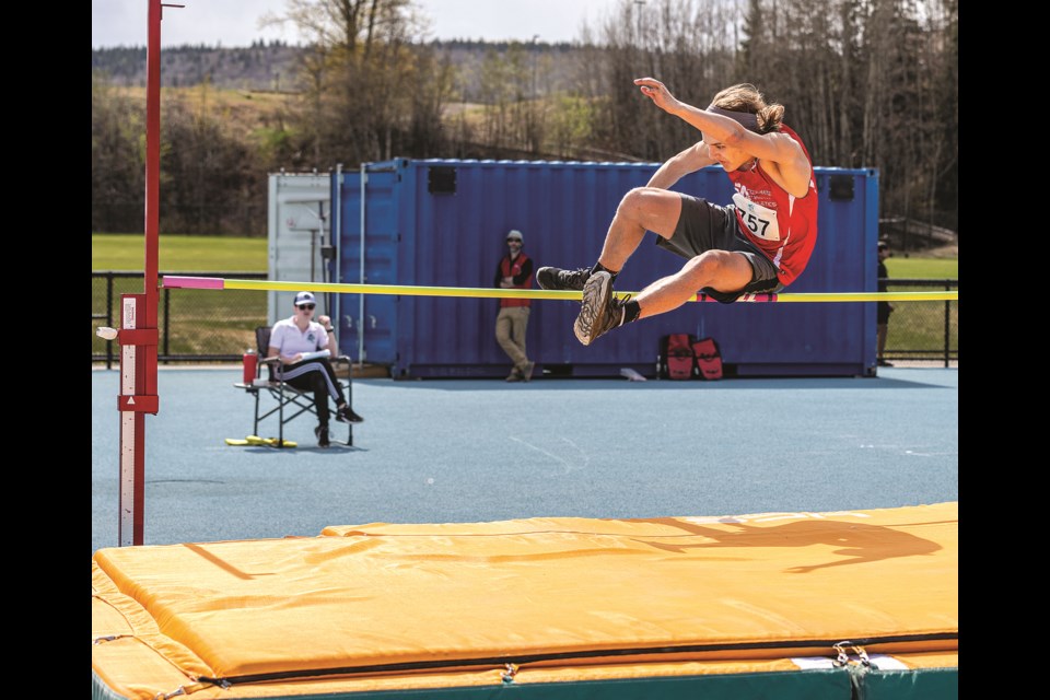 Hudson Noble, 13, with the Accelrate North Athletics club uses the scissor technique to clear 1.40 metres Saturday during the high jump compettion at the Sub Zero Track Meet at Masich Place stadium on Saturday, May 4, 2024 in Prince George, B.C.
