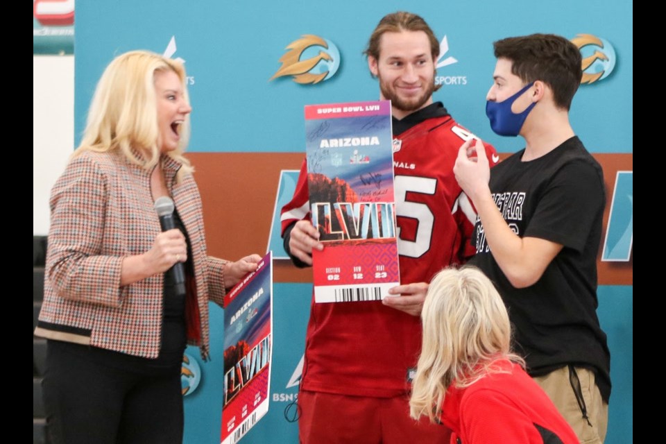 Kevin Winegar was well enough to attend an athletics assembly at Eastmark High Jan. 13, 2023... that turned out to be a cover for the big surprise. That's where the Arizona Cardinals presented him with tickets to the big Feb. 12 championship game at State Farm Stadium in Glendale.