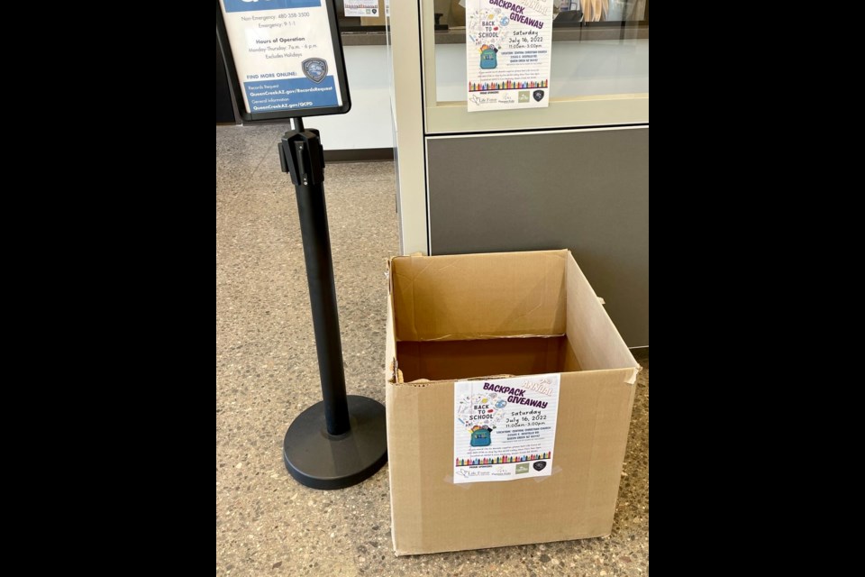 A donation box is set up in the lobby of the Law Enforcement and Community Chambers building, at 20727 Civic Parkway in Queen Creek. 